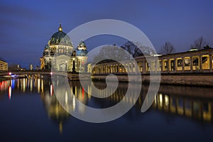 Berliner Dom and Spree River in Berlin at dusk photo