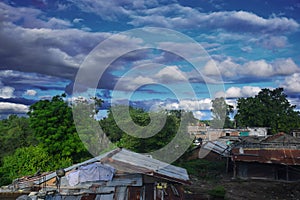 Beautiful view of Indian village in rainy season, cloudy sky and greenery