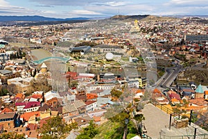 Beautiful view of Kura river and Bridge of Peace in Tbilisi