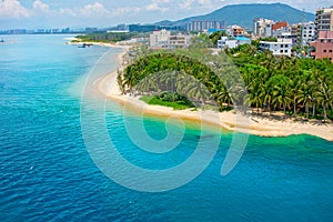 Beautiful view of the lagoon with white sand and palm trees, turquoise sea. view from the top.