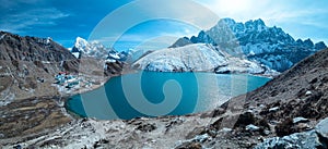 Beautiful view of Lake Gokyo, Mountains Amadablam and Everest covered with snow photo