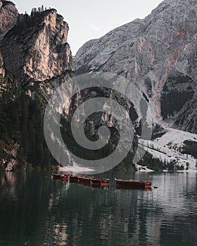 Beautiful view of a lake and mountains in the background in Dolomites in Italy