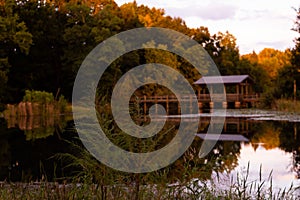 Beautiful view of a lakehouse and a lake with reflection of trees in North Augusta, South Carolina