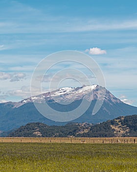 Beautiful view of a landscape with Cerro Mackay mountain and fields near Patagonia, Chile