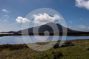 Beautiful view of loch and hill near Locheport. Bay on North Uist, Outer Hebrides, Scotland.