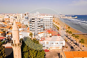 Beautiful view of the main street of Larnaca, cathedral and Phinikoudes beach