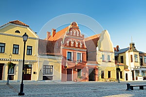 Beautiful view of the market square of Kedainiai, one of the oldest cities in Lithuania. Unique colorful Stikliu houses in golden