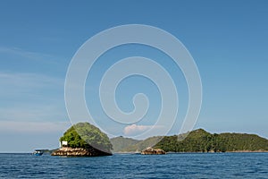 Beautiful view of Mike\'s Island in the middle of the ocean captured in Raja Ampat