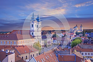 Beautiful view of the Minorit church and the panorama of the city of Eger, Hungary, at sunset