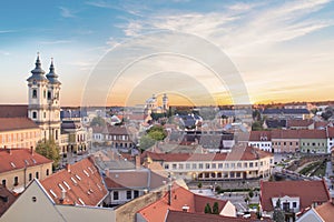 Beautiful view of the Minorit church and the panorama of the city of Eger, Hungary, at sunset