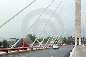 Beautiful view of modern bridge with asphalt road photo