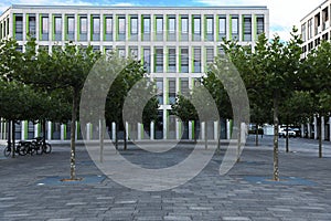 Beautiful view of modern building with big windows and trees outdoors