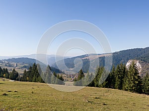 Beautiful view of Mount Vlasic in Babanovac during sunny day with haze in distance in autumn