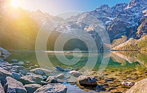 Beautiful view of the mountain lake at sunrise in the Tatra Mountains.