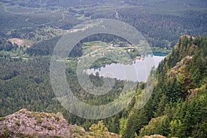 Beautiful view from mountain top on hikers on the rock