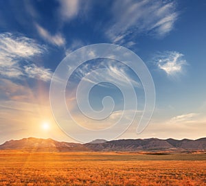 Beautiful view at the mountain valley at sunset in summer