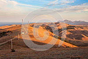 Beautiful view at the mountain valley at sunset in summer