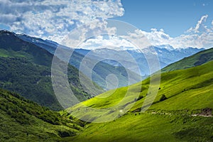 Beautiful view on mountains ranges. Mountain landscape on summer sunny day in Svaneti, Georgia. Alpine valley. Caucasus highlands