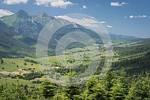 Beautiful view of mountains in Slovakia. Bachledova dolina, Zdiar village and Belianske Tatry mountains seen from an elevated