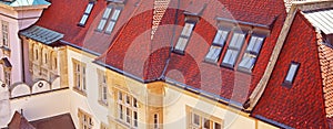 Beautiful view of old vintage building with red roof