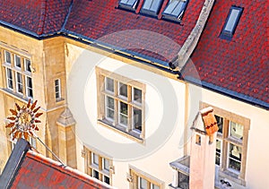 Beautiful view of old vintage building with red roof