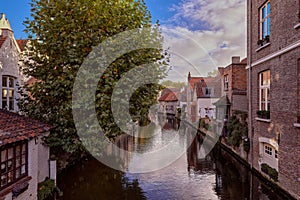 Beautiful view of one of the canals in Bruges with its typical flemish houses