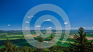 Beautiful view over green colorful valley with fields, Czech Republic