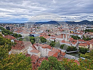 Beautiful view over the old city center of Graz, with Mariahilfer church and historic buildings, in Styria region, Austria