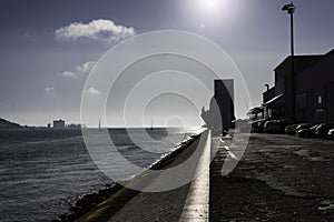 Beautiful view over the Tagus riverside in the heart of Lisbon in Portugal. Landscape of urban Lisbon during a hot summer day at