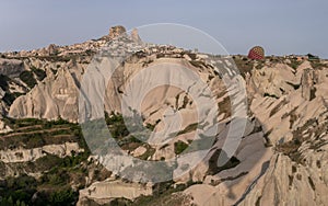 Beautiful view over the town of Uchisar, at the Pigeon Valley, Cappadocia, Turkey, on a sunny day