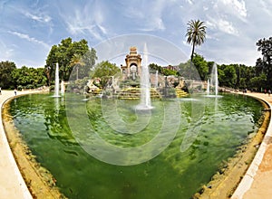 Beautiful view of the Parc de la Ciutadella with fountains on a sunny day in Barcelona, Spain photo