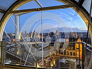 Beautiful view of Paris at sunset time from inside Pompidou center