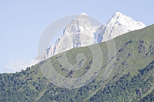 Beautiful view of peak Ushba from village Zhabeshi , Georgia photo