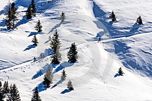 Beautiful view of people cycling across snowy mountains in South Tyrol, Dolomites, Italy