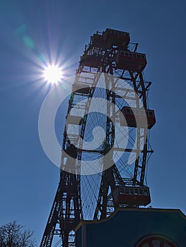 Beautiful view of popular Ferris wheel (Riesenrad) at theme park Wurstelprater in Vienna, Austria.