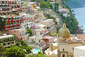 Beautiful view of Positano village with colorful houses and dome of the church, Amalfi Coast, Italy