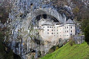 The beautiful view of Predjama Castle in Postojna Cave