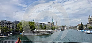 Beautiful view of the river and architectures in the city of Zurich under cloudy sky in Switzerland