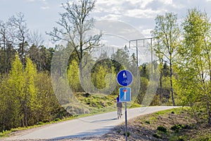 Beautiful view of road signs for pedestrians and bicycles and warning for dead end road.