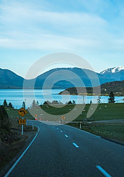 Beautiful view from the road to Glenorchy with the Wakatipu Lake and the mountain in the background taken on a winter day in