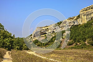 Beautiful view of rocks and fields. trail around the cave city of Chufut-Kale.