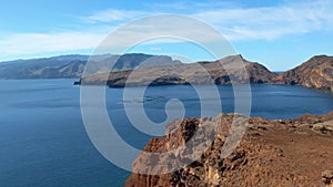 Beautiful view of the rocky coast of Madeira Island in the Atlantic Ocean.