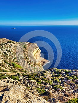 Beautiful view of rocky coastline. A picture paints a thousand words. Amazing sea and mountains. Cliff, ocean. A sunny day with