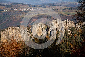 Beautiful view of the rocky ridge of Suche skaly Dry Rocks surrounded by forest, Fantastic sharp rock wall and sandstone