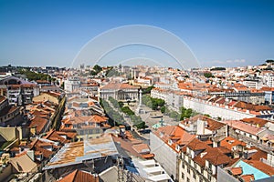 Beautiful view from the roof of Santa Justa on Lisbon and the Queen Maria II National Theatre. Cityscape with the Lisbon rooftops
