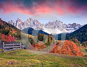 Beautiful view of Santa Maddalena village in front of the Geisler or Odle Dolomites Group. Colorful autumn sunset in Dolomite Alps