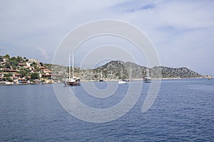 Beautiful view of the sea bay and pleasure yachts on a sunny summer day