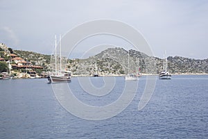 Beautiful view of the sea bay and pleasure yachts on a sunny summer day