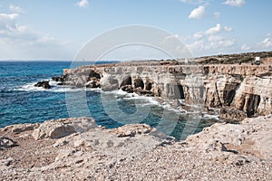 Beautiful sea caves near cape Greco in national park with turquoise water