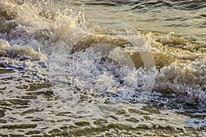 A beautiful view of sea waves. Background of foam and waves .